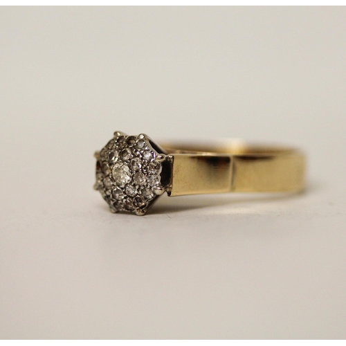 611 - A large diamond cluster ring, on yellow gold band marked '18ct'. Ring size U, gross weight 6.1g