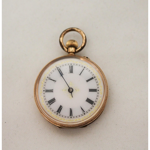 576 - A Victorian 14k gold outer cased fob watch