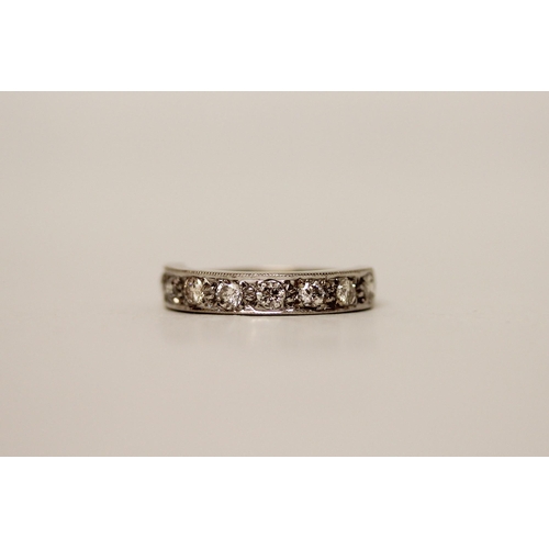 595 - A vintage 18ct white gold diamond half hoop eternity ring, size N, gross weight 4 .1 grams