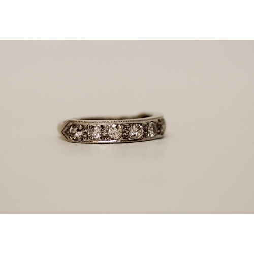 595 - A vintage 18ct white gold diamond half hoop eternity ring, size N, gross weight 4 .1 grams