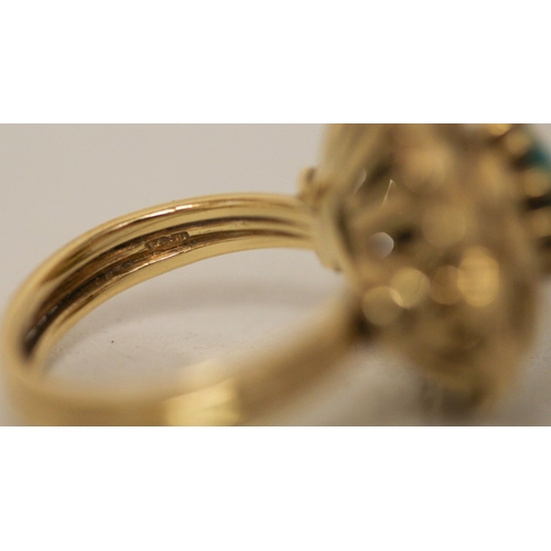 628 - A turquoise and diamond circular cluster dress ring, in yellow gold mount, Chinese marks K18. Gross ... 