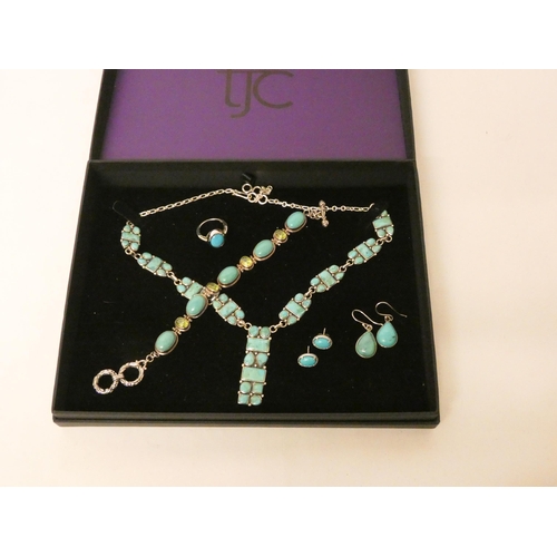 589 - A silver peridot and turquoise panel bracelet, turquoise and silver necklace, two pairs of earrings ... 