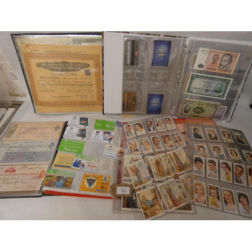 313 - A collection of foreign bank notes, old cheques, telephone cards, share certificates and cigarette c... 