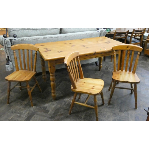 31 - Modern varnished pine kitchen farmhouse table together with three chairs
