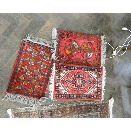 97 - Three various Bokhara and other rugs (worn) and three small Persian style prayer mats