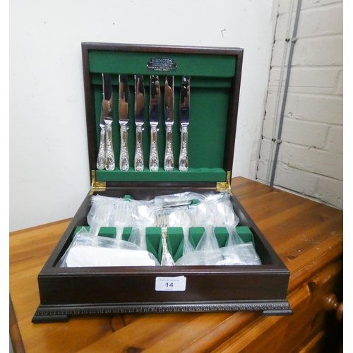 14 - An Elkington ornate silver plated canteen in mahogany case