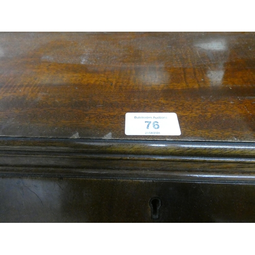 76 - A flame mahogany bureau with two long drawers under standing on cabriole legs, 2'6