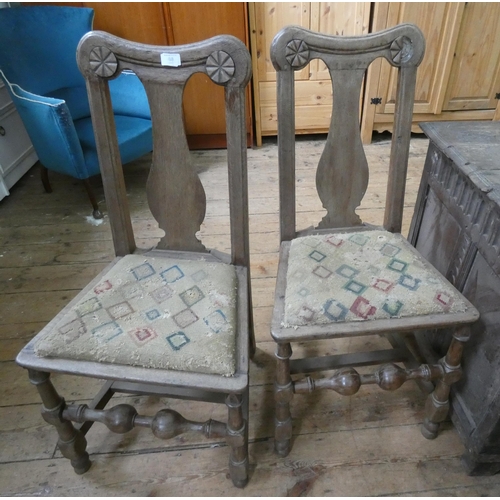 68 - A pair of antique oak dining chairs with tapestry seats