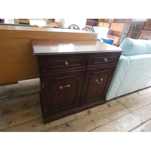 78 - A small reproduction mahogany sideboard fitted two drawers and cupboards, 2'9 wide