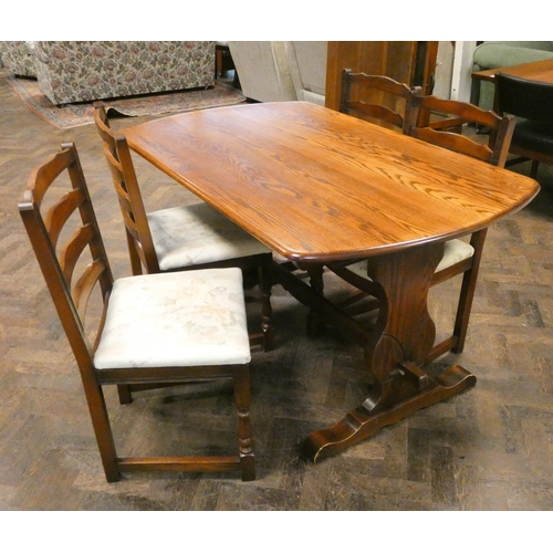 59 - An oak refectory style dining table, 5' X 3' together with a set of four ladder back dining room cha... 