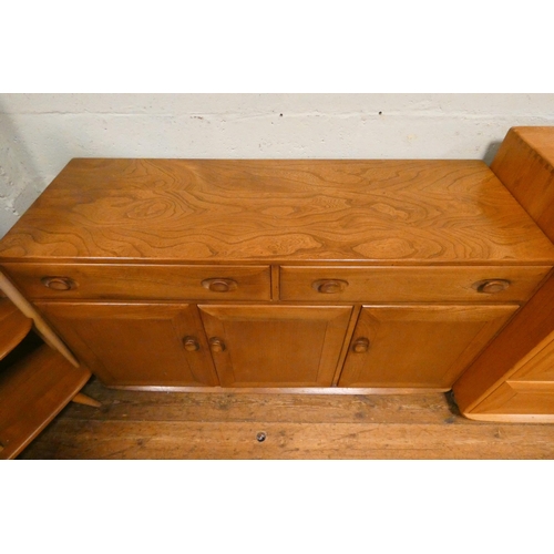 124 - An Ercol Windsor Blonde Elm sideboard fitted two drawers and three cupboards. 4'6