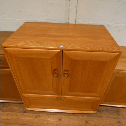 125 - An Ercol Windsor Blonde Elm TV/video cabinet, 34 1/2