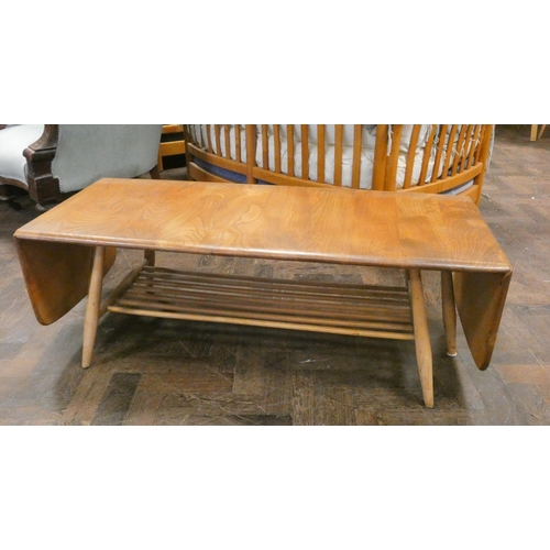 136 - An Ercol Blonde Elm long drop leaf coffee table 3'6