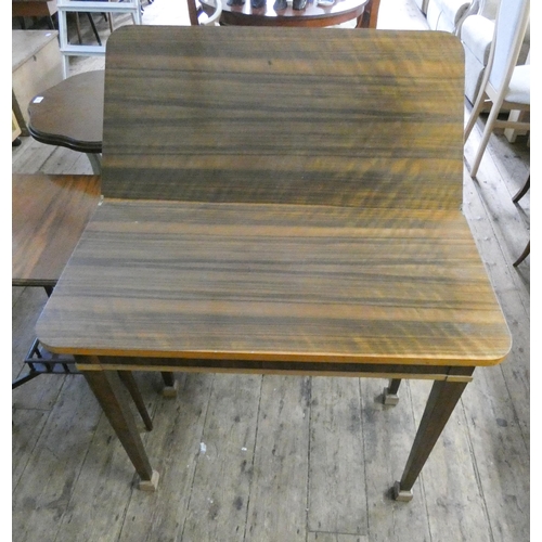 78 - A mahogany folding top tea table on square legs. 3' wide