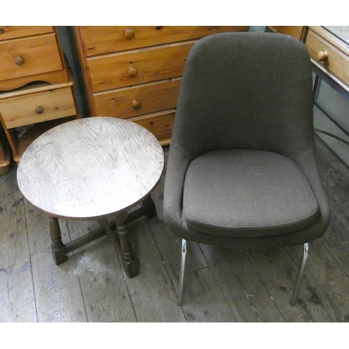 90 - A 1960's/1970's brown upholstered tubular framed chair and a circular oak coffee table