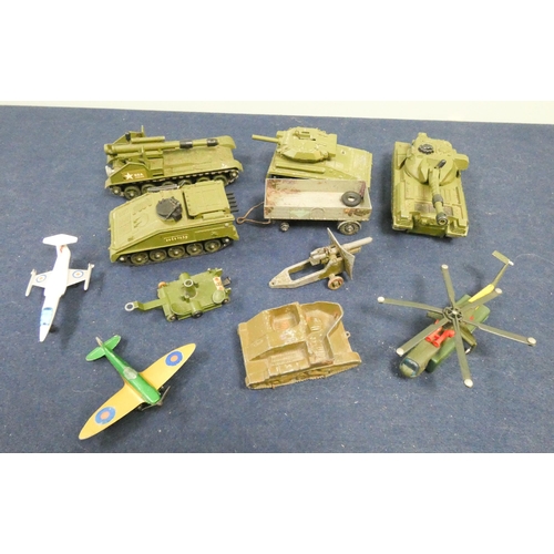 536 - A collection of Dinky toys in played with condition, military tanks and vehicles