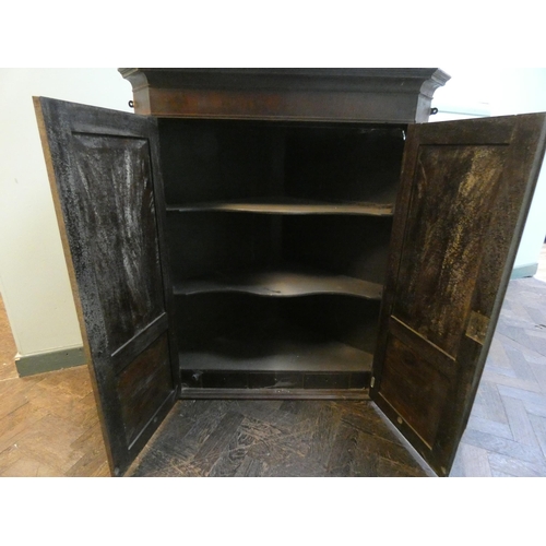 167 - A Georgian mahogany and line inlaid hanging corner cabinet