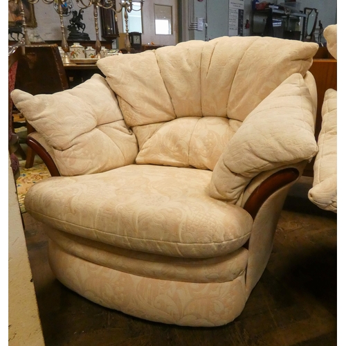 187 - A small tub shaped two seater settee three piece lounge suite in pale cream and pink figured coverin... 