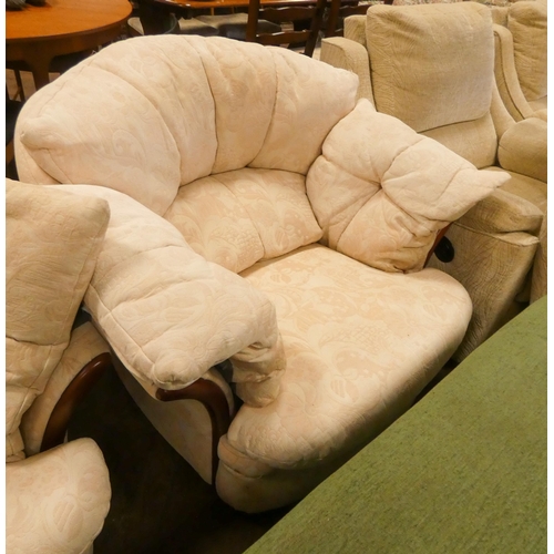 187 - A small tub shaped two seater settee three piece lounge suite in pale cream and pink figured coverin... 