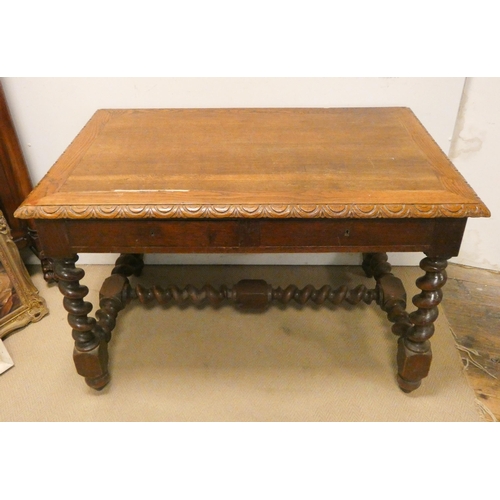 340 - An oak library or centre table with carved borders standing on barley twist base with cross stretche... 