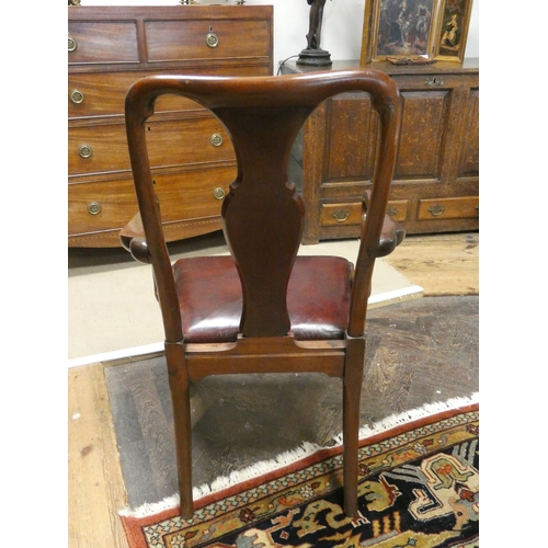 401 - An antique mahogany vase splat open elbow chair on carved cabriole legs to hoof feet