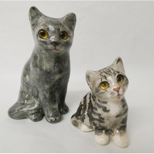 216 - A Winstanley cat and kitten. Both with glass eyes. Signed. Tallest measures 19cm