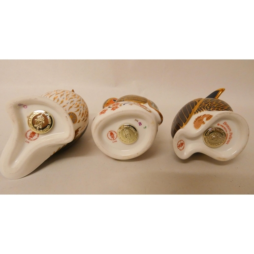 225 - A collection of three Royal Crown Derby paperweights. Puffin, Kingfisher and a Pelican