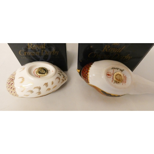 234 - Two Royal Crown Derby paperweights. Woodland pheasant and dappled Quail. Both boxed.