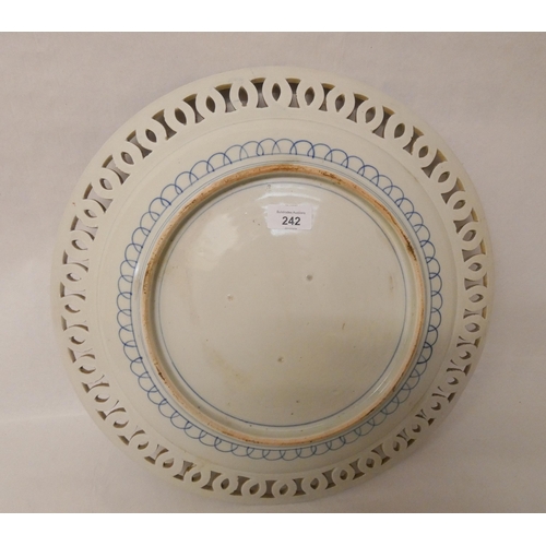 242 - A large Imari charger plate with pierced edge. 46cm diameter