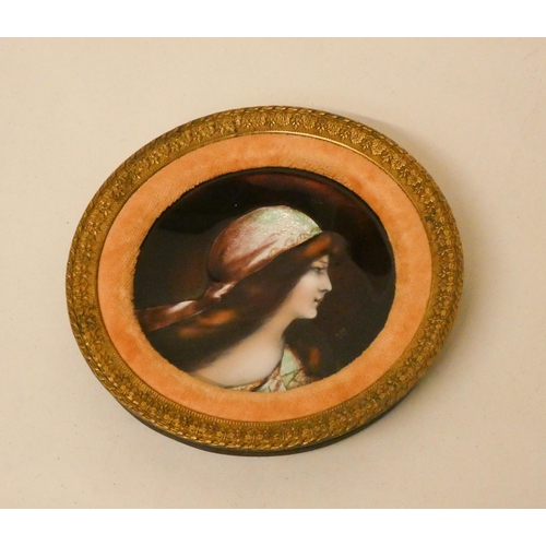 247 - French enamel circular plate decorated with a portrait bust of a maiden, monogrammed, within velvet ... 