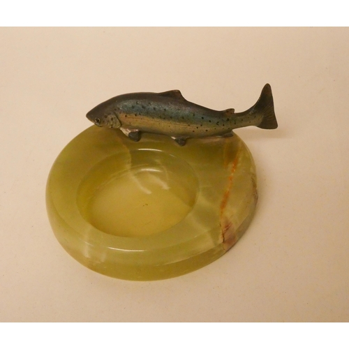 248 - An Art Deco cold painted bronze and onyx ashtray modelled with a trout mounted on a onyx base with c... 