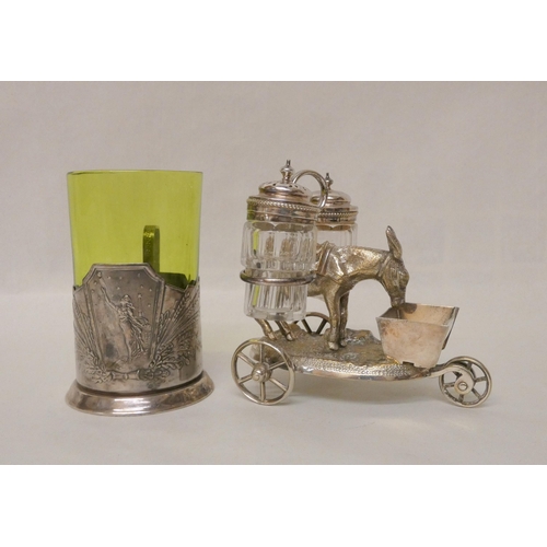 569 - A silver plated donkey cart cruet and an Art Nouveau green glass beaker in silver plated holder