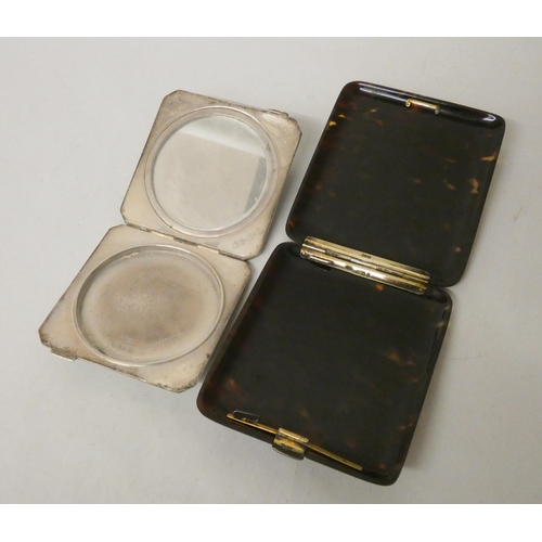 570 - An Art Deco hallmarked silver and black enamel compact of square form together with a tortoishell ci... 