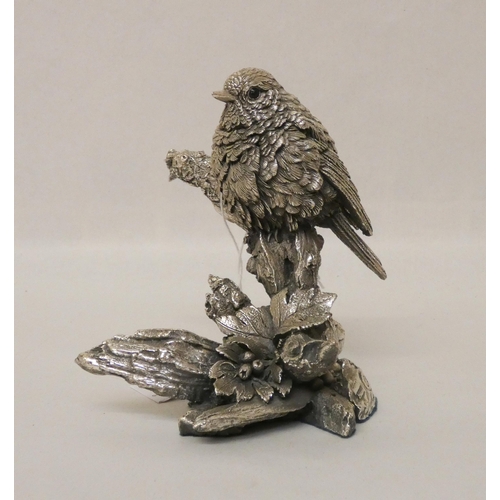 578 - A modern hallmarked silver covered model of a robin. Naturalistically modelled, sitting on a branch.... 