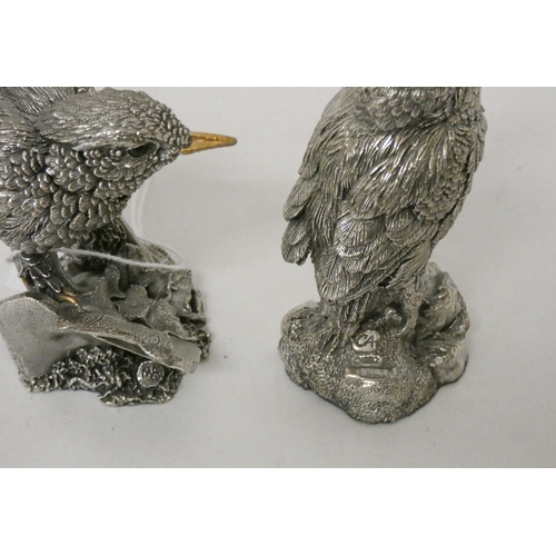 579 - Two modern hallmarked silver covered models of birds. A wren and a kingfisher. Approx 9cm tall.