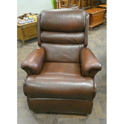 147 - A manual reclining easy chair in brown leather