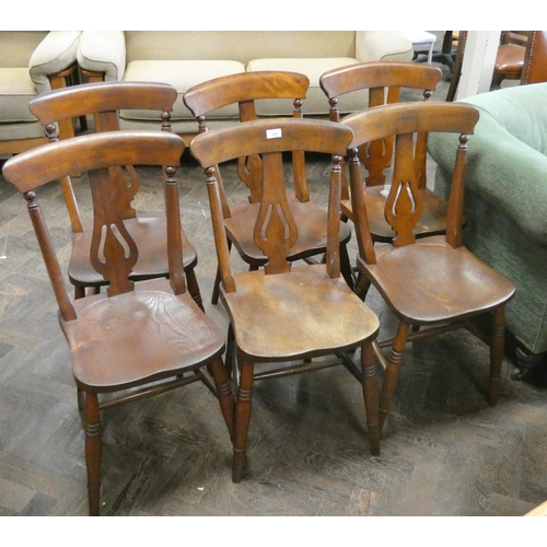 151 - A set of six antique Windsor dining room chairs with elm seats and vase shaped splat backs