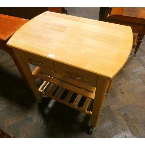 162 - A light beech three tier trolley kitchen work table fitted with two drawers. 2'9