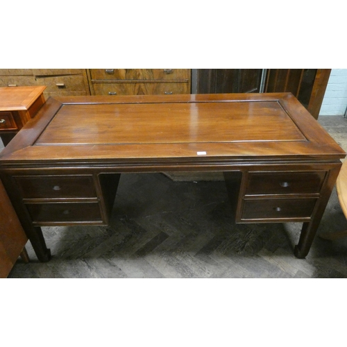 165 - A Chinese hardwood knee hole writing desk fitted four drawers 5'3