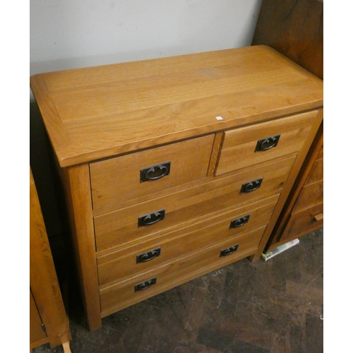 191 - A modern light oak chest of three long and two short drawers. 3' wide