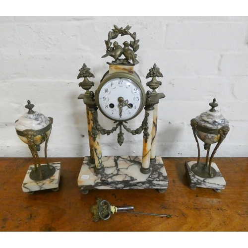 302 - A late 19th Century French three piece clock garniture with striking movement, brass dove mounts sta... 