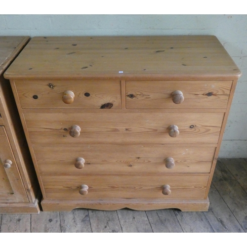 322 - A Victorian style stripped pine chest of three long and two short drawers with bun handles. 3'3