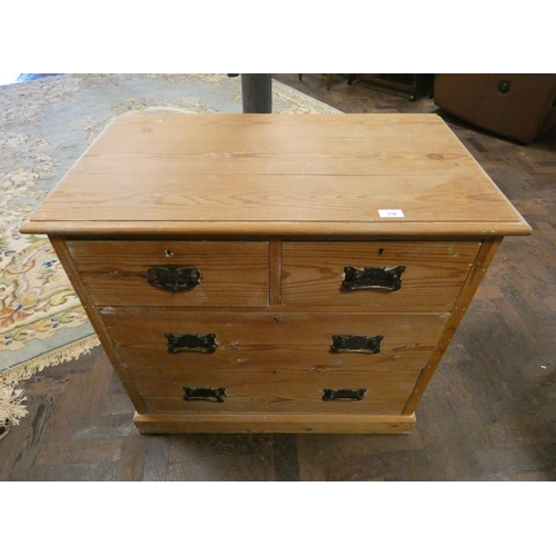 338 - A stripped pine chest of two long and two short drawers. 3' wide