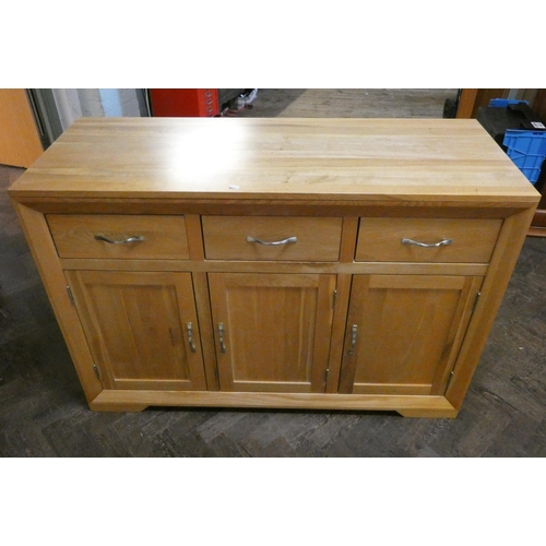 356 - A modern light oak sideboard fitted three drawers and cupboards. 52