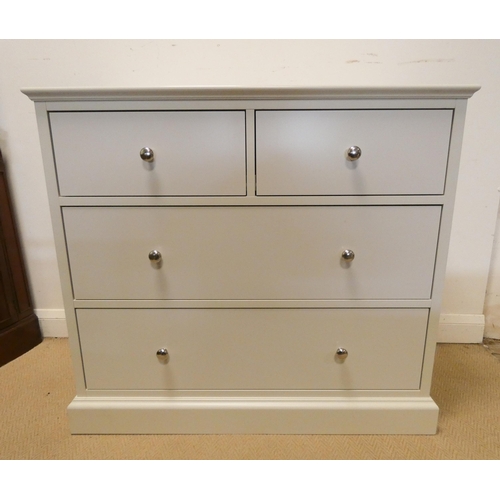 365 - A modern cream chest of two long and two short drawers, a matching dressing table with stool and a t... 