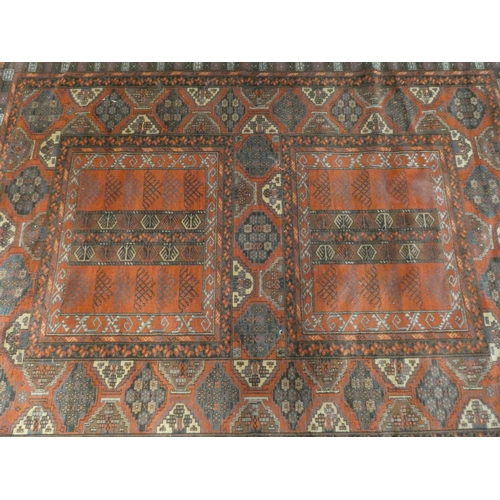 376 - A red and patterned Persian designed wool pile rug 6'6