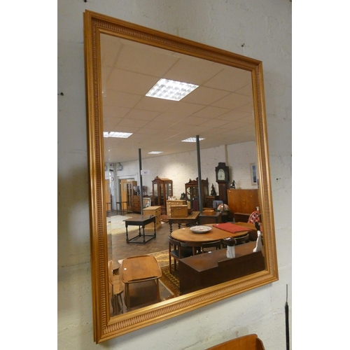 387 - A large bevelled wall mirror in gilt frame 4'3