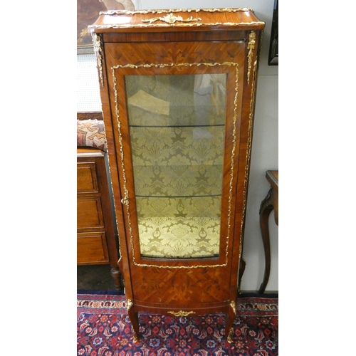 416 - A French Kingwood and marquetry inlaid shaped front china display cabinet with gilt metal mounts. 28... 