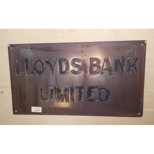 418 - A brass Lloyds Bank Ltd wall plaque