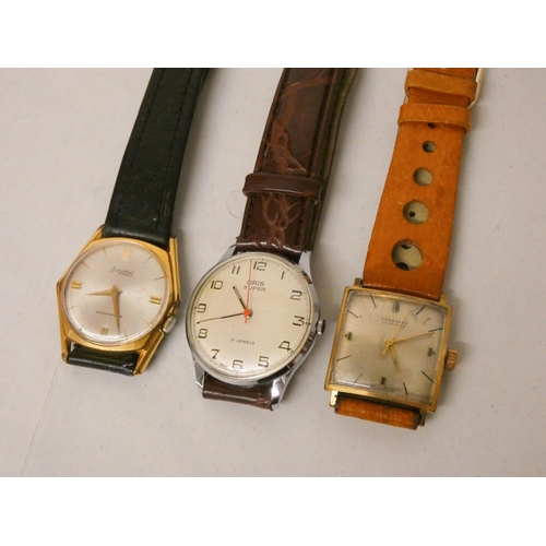 615 - A collection of three gents automatic wrist watches. By Oris, Accurist and Junghans